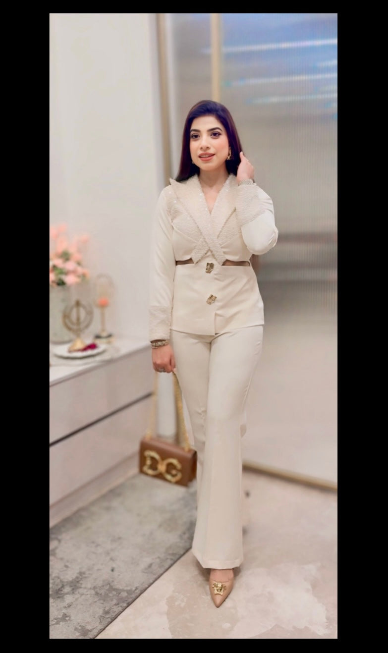 Ivory elegance with tailored perfection.
A statement co-ord designed for the woman who carries grace and power effortlessly.